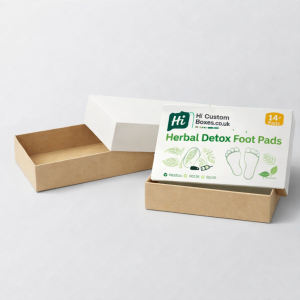 Two upright retail boxes with hanging tabs, one plain white and one with blue-green branding.
