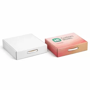 Two slim cardboard boxes with carry handles, one plain white and one with pink decorative patterns.