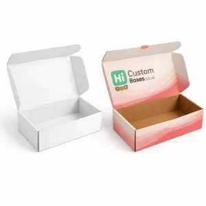 Two open cardboard mailer boxes, one plain white and one with pink wave patterns and branding.
