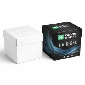 A minimalist white square box next to a branded black square box for hair gel