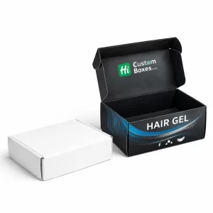 A minimalist white square box next to a branded black square box for hair gel
