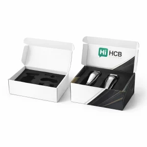 Two open premium boxes featuring black foam inserts designed to hold professional hair clipper sets securely.