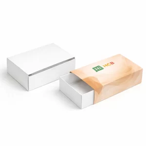 Slide-out match box style shapewear packaging in a soft pink hue with a sleek, modern design.