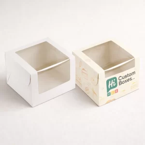 Two retail cartons with cutout windows, one plain white and one showing blue floral branding.