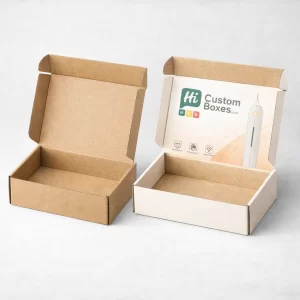 Two open cardboard mailer boxes, one plain brown and one with custom white and peach branding.