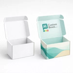Two open white mailing boxes showing internal printed patterns and a logo on the lid.