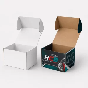 Pair of premium automotive component boxes in black and blue with clean, professional branding designs.