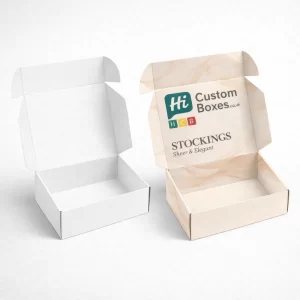 Two open cardboard mailer boxes; one plain white and one featuring elegant tan wave patterns.