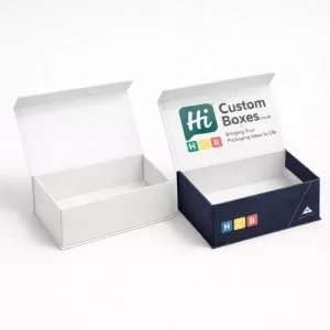 Two luxury magnetic gift boxes, one plain white and one navy blue with custom branding.