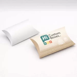 Two pillow-shaped gift boxes, one plain white and one branded kraft paper for lightweight knitwear.