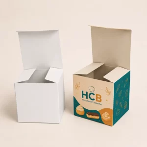 Premium white and pink sweet treat boxes with custom logos and decorative patterns for bakeries.