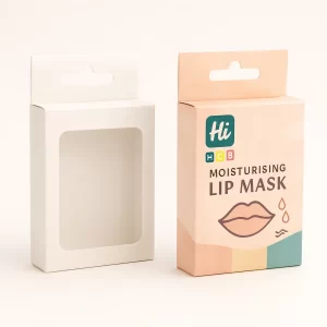 A white windowed box and a colourful peach box with a large lip graphic