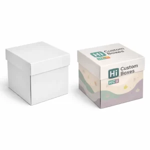 Two square gift boxes with lids, one minimalist white and the other decorated with autumn leaves.