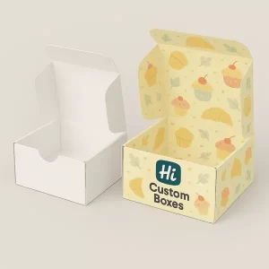 food boxes one plain white one yellow with Hi Custom Boxes branding and bakery themed prints