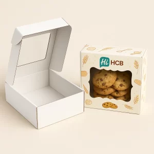 Square cardboard mailer cookie boxes featuring top display windows and custom HCB printed logos.