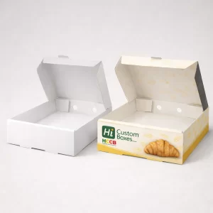 Premium printed croissant boxes with elegant branding and a secure folding lid for bakery products.