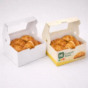 Bulk collection of plain white and printed croissant boxes suitable for wholesale bakery packaging supplies.