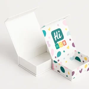 Rigid chocolate gift boxes with hinged lids - one plain white- one printed with pastel patterns- colorful hearts- and Hi HCB logo inside lid