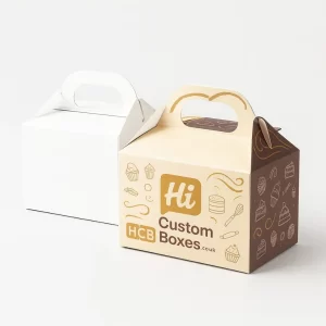 Dome shaped brown and cream cake boxes with top handles and elegant printed bakery themed illustrations.