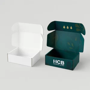 White and branded custom mailer boxes, open, showing printing on the inside and outside.