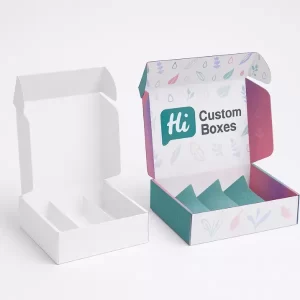Two open mailer boxes, one plain white and one fully printed in teal, pink, and purple with Hi Custom Boxes branding inside the lid.