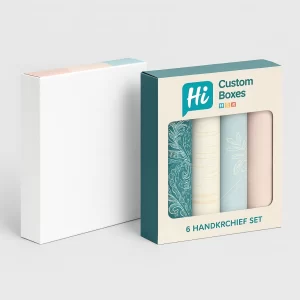 Two small, square rigid lift-off lid boxes for handkerchiefs, one branded, one plain white.