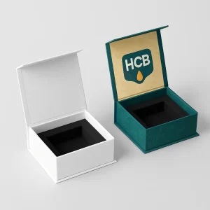 Open luxury rigid boxes with magnetic closures and black foam inserts for concentrate products.