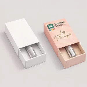 Two elegant sliding drawer boxes showing a silver lip plumper tube nestled inside a secure insert.