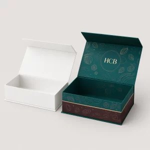 Open luxury rigid boxes with magnetic closures, customised with cocoa bean illustrations.
