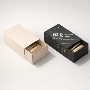 Two sliding drawer-style boxes in beige and black, containing gold highlighter tubes on a light background.