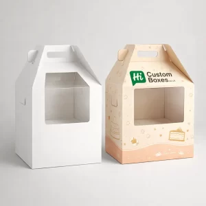 Two tall white and patterned gable boxes with handles and transparent windows for viewing cakes.