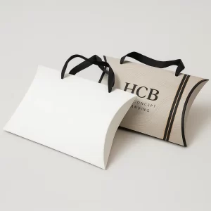 Elegant apparel pillow packaging boxes with handles- one white and one brown with black stripes
