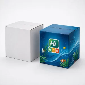 Two square cardboard shipping boxes, one plain white and one with a vibrant blue underwater fish design.