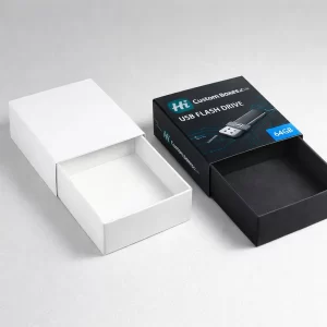 Two sliding drawer-style boxes, one plain white and one black with USB product illustrations.