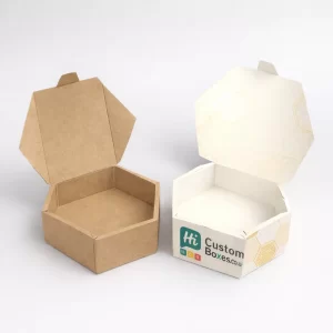 Two open hexagonal cardboard containers, one natural brown and one bespoke white with a honeycomb pattern.