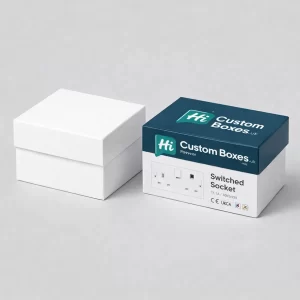 Two small square boxes; one is plain white, the other features blue