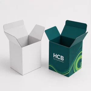 Premium magnetic closure gift boxes in white and teal branded colours.