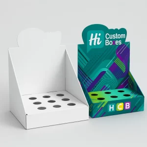 Custom corrugated display boxes made from natural brown cardboard- one printed with a vibrant pattern