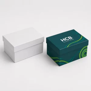Two-piece rigid gift boxes in plain white and teal branding designs.