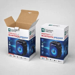 Custom Bluetooth Speaker Boxes.webp Image ALT: Two cardboard speaker boxes featuring blue glow graphics, with one box shown open at the top.