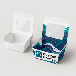 Open shallow food boxes featuring a clear window in the lid and colourful wavy patterns
