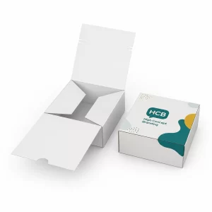 Flat-folding white and branded teal self-locking cardboard boxes designed for efficient storage and secure retail packaging.