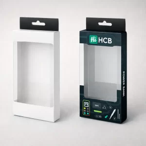 Slim retail boxes with clear plastic windows and hanging tabs, including a branded power bank box.