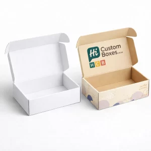 Robust cardboard mailer-style hamper boxes- featuring internal branding and a charming pastel splash design