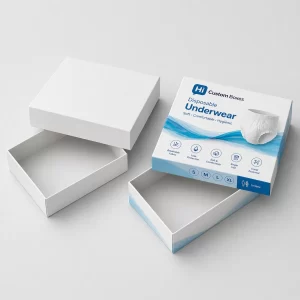 A white cardboard box standing next to a purple floral branded box for disposable underwear.