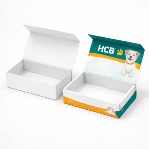 Two open flat-style boxes, one minimalist white and one with a colourful dog graphic and HCB logo.