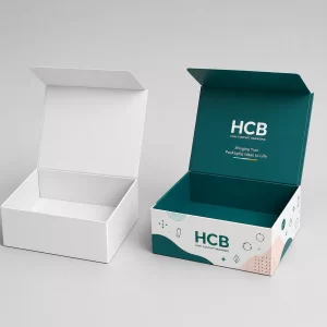 Premium magnetic closure rigid boxes with a teal interior and high-concept branding for e-commerce retailers.