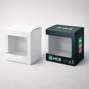 Two square cardboard boxes, one plain white and one with dark circuit patterns and a window.