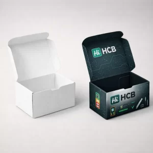 Tall rectangular packaging boxes in white and dark grey, featuring a black hanging tab for retail.