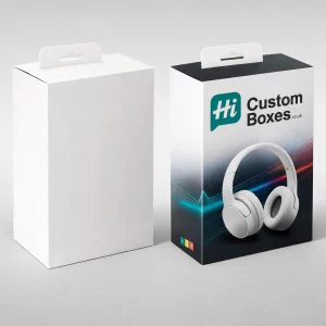 Two rectangular cardboard boxes with hanging tabs- one plain white and one with printed headphone graphics